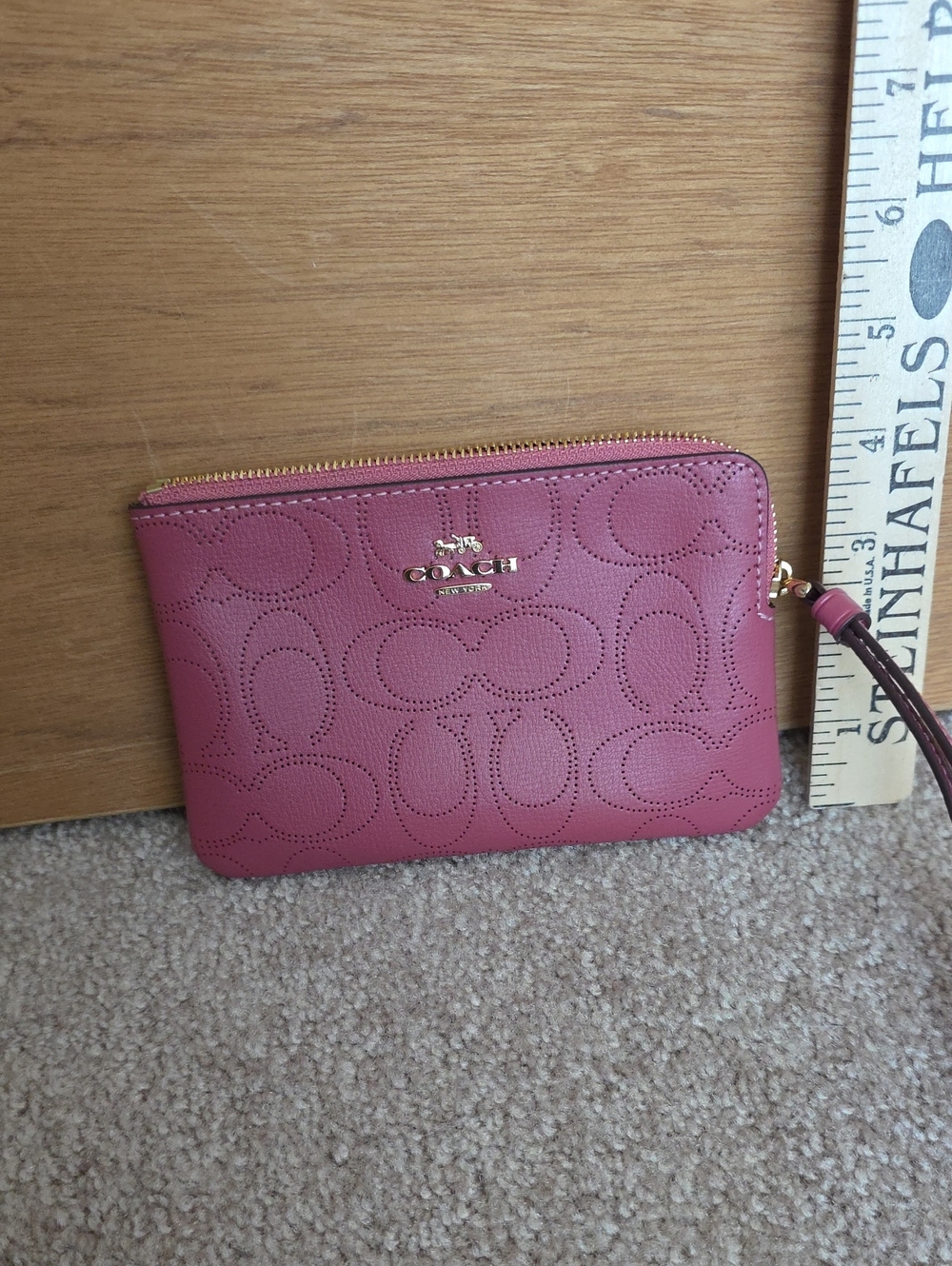 Coach Rose Pink Perforated Signature Leather Wristlet